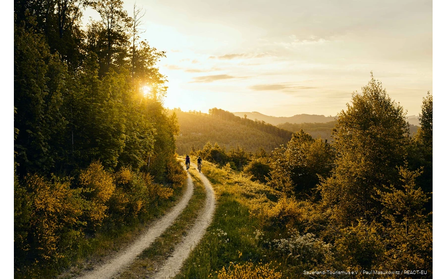 Gravel biking 2 Two gravel bikers on the road in the Bike Arena Sauerland near Lennestadt.