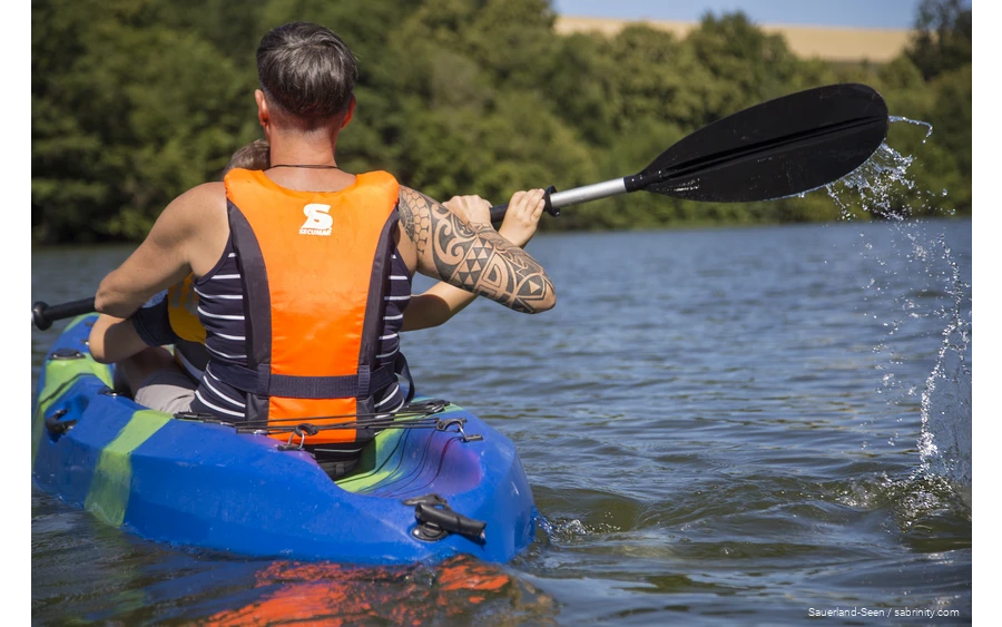 Man and a child canoeing