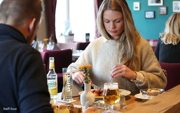 Eating together in the "Stadtkern" restaurant.