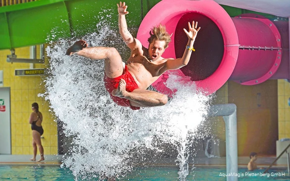 A young man is catapulted out of the Pink Jump.