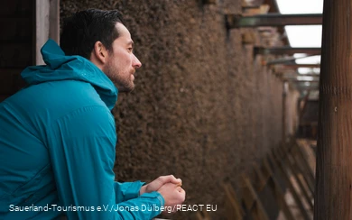 A man takes a deep breath at the Gradierwerk