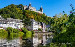 The Lenne in Altena with houses and castle in the background