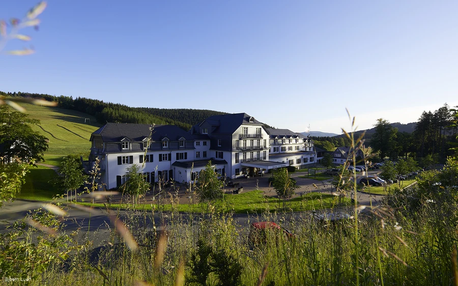 Uitzicht op Hotel Rimberg in de zomer