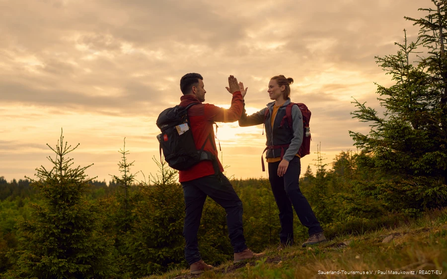A couple on the Rothaarsteig long-distance hiking trail.