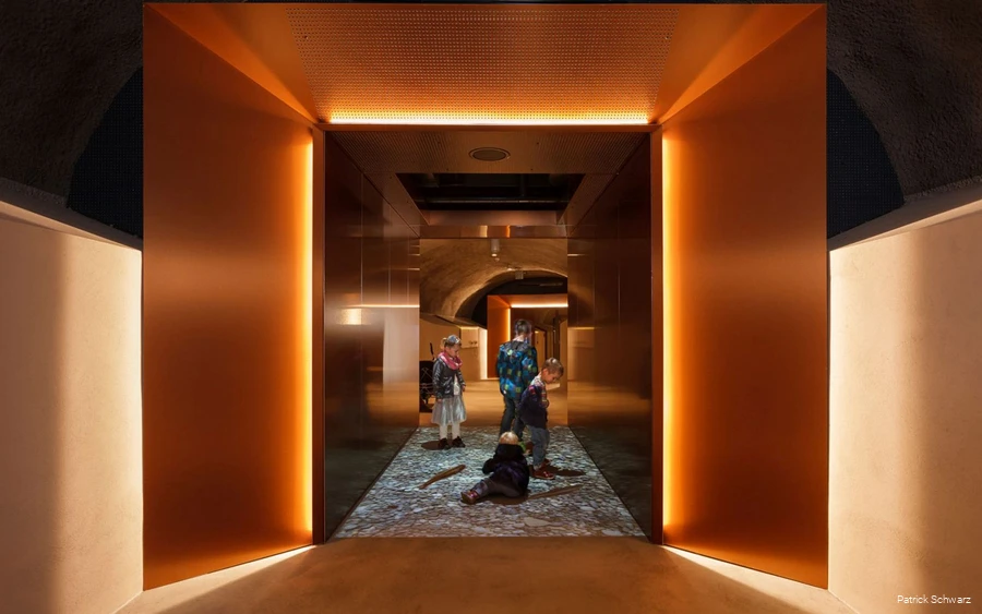 Four children discover the corridor to the adventure elevator.